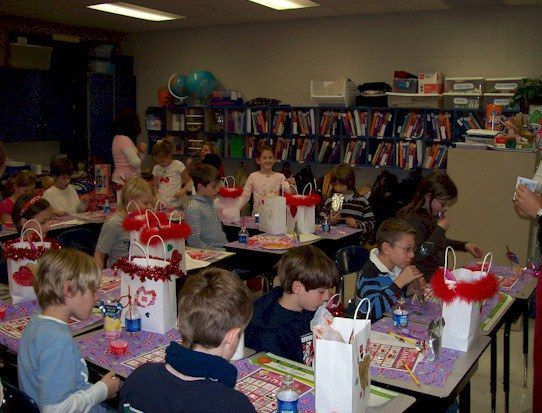 Children seated at classroom tables